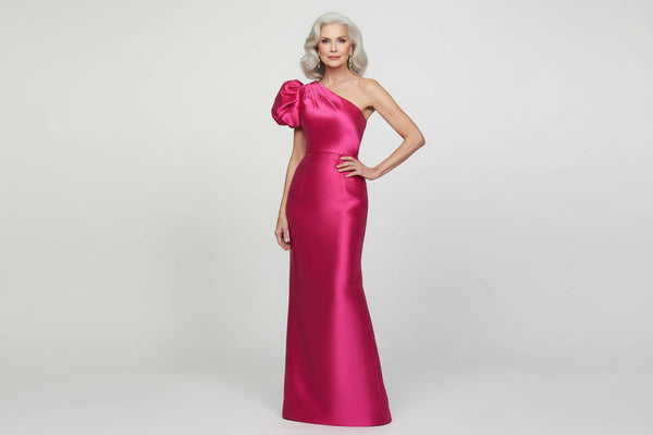 Barbie mother of the bride dress Woman wearing a pink one-shoulder gown on a white background