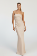 Mary bridal party dress Woman wearing a strapless beige gown on a white background