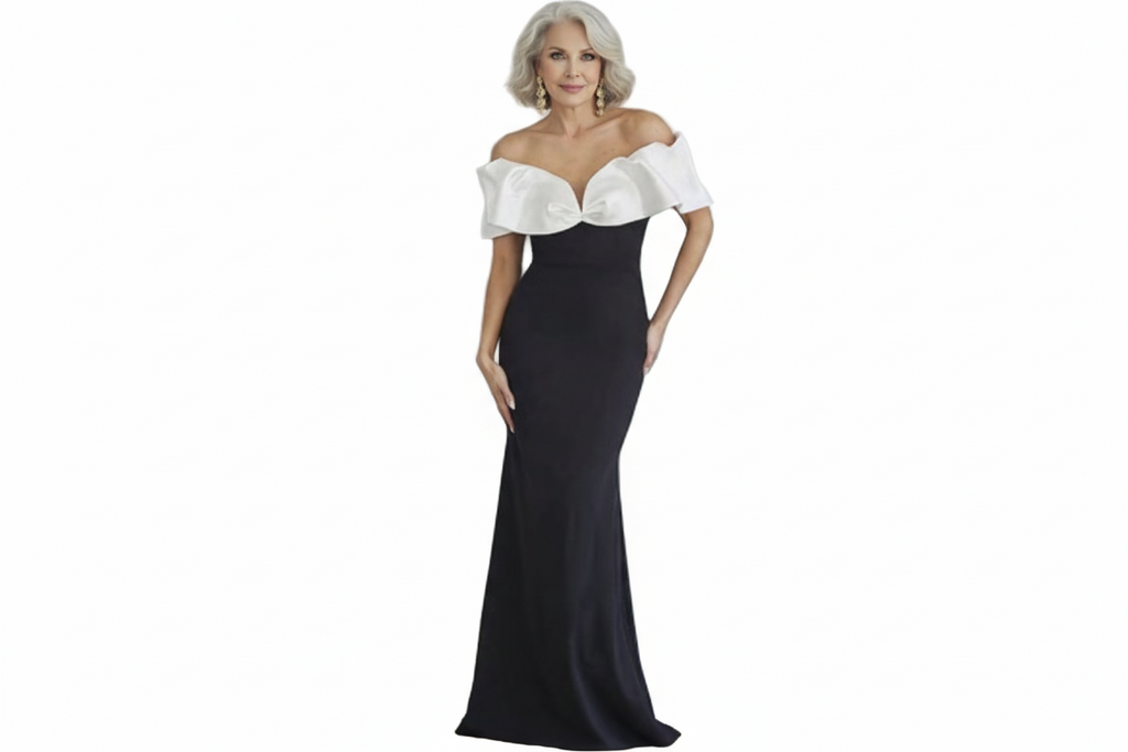 Woman wearing a black and white off-shoulder evening gown on a white background Natalia mother of the bride dress