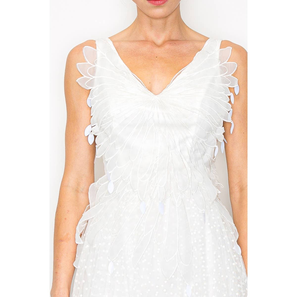 Vanessa elegant bridal dress A white, sleeveless tulle midi dress with flared details, an asymmetric hem, and side invisible zipper.
